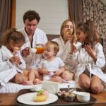 smiling-family-eating-breakfast-in-the-hotel-2022-03-08-23-07-07-utc.jpg